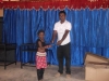 mr-ananda-donating-shoes-to-masmulla-child