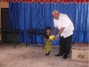 mr-g-donating-shoes-to-masmulla-child1