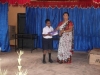 mrs-g-donating-shoes-to-masmulla-child1