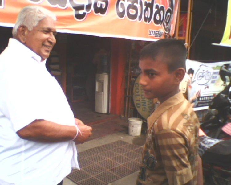215-gayan-with-mr-gamage-near-the-book-shop