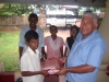 mohamad-faslan-receiving-gifts-from-kennington-children